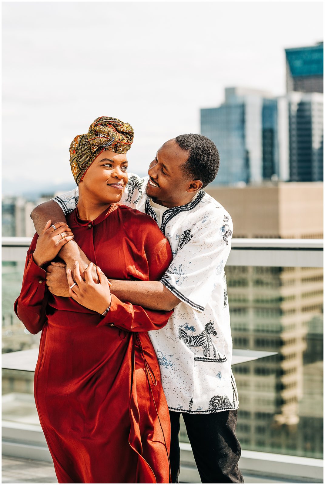 Black couple at engagement session at pike place market in downtown seattle