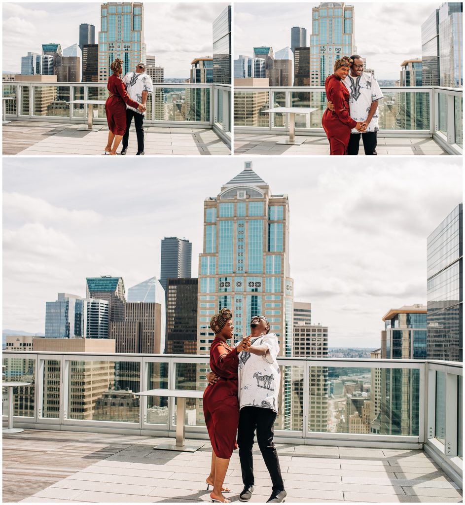 Black couple at engagement session at pike place market in downtown seattle, captured by candace photography