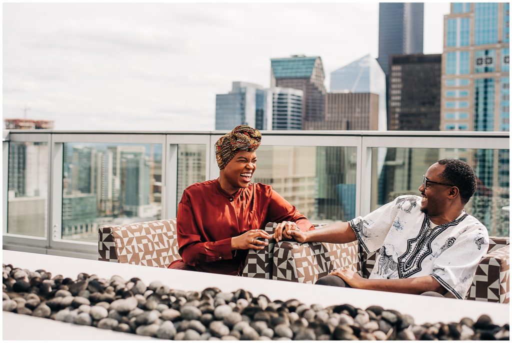 Black couple at engagement session at pike place market in downtown seattle