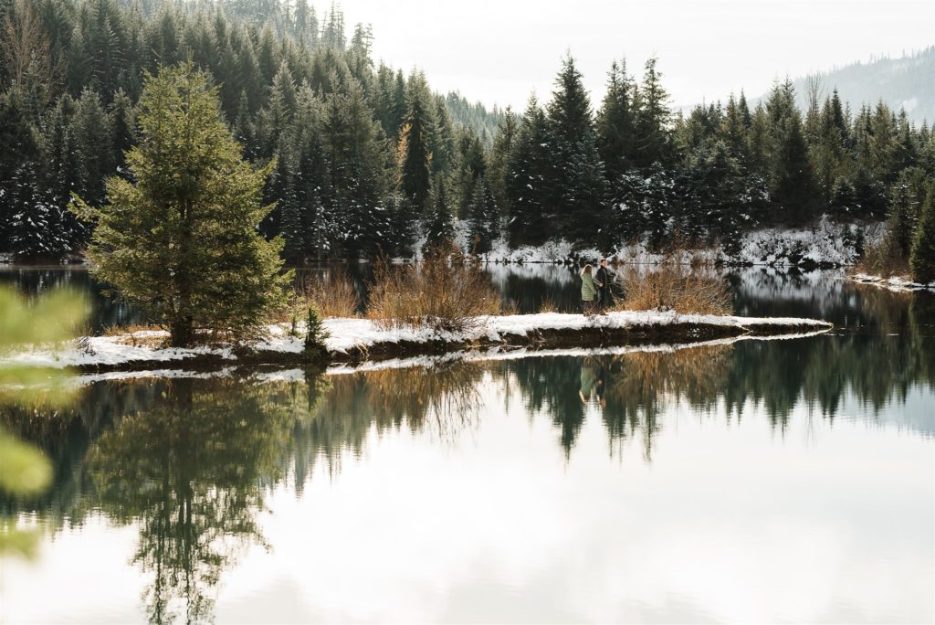 snowy engagement session at gold creek pond