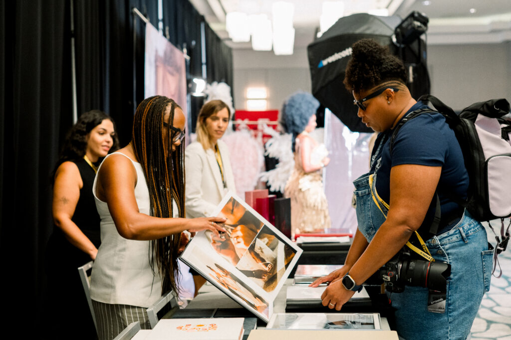 Seattle wedding photographer Candace Connor connecting with fellow photographers while teaching and mentoring as an industry educator.