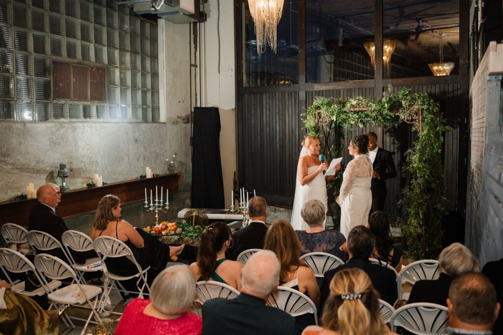 Wedding ceremony at The Press Room in Tacoma with guests gathered for an intimate celebration