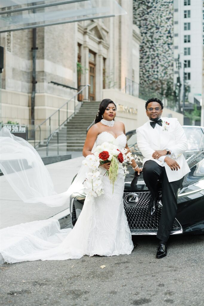 Stylish wedding portraits at Lotte Hotel Seattle with downtown architecture