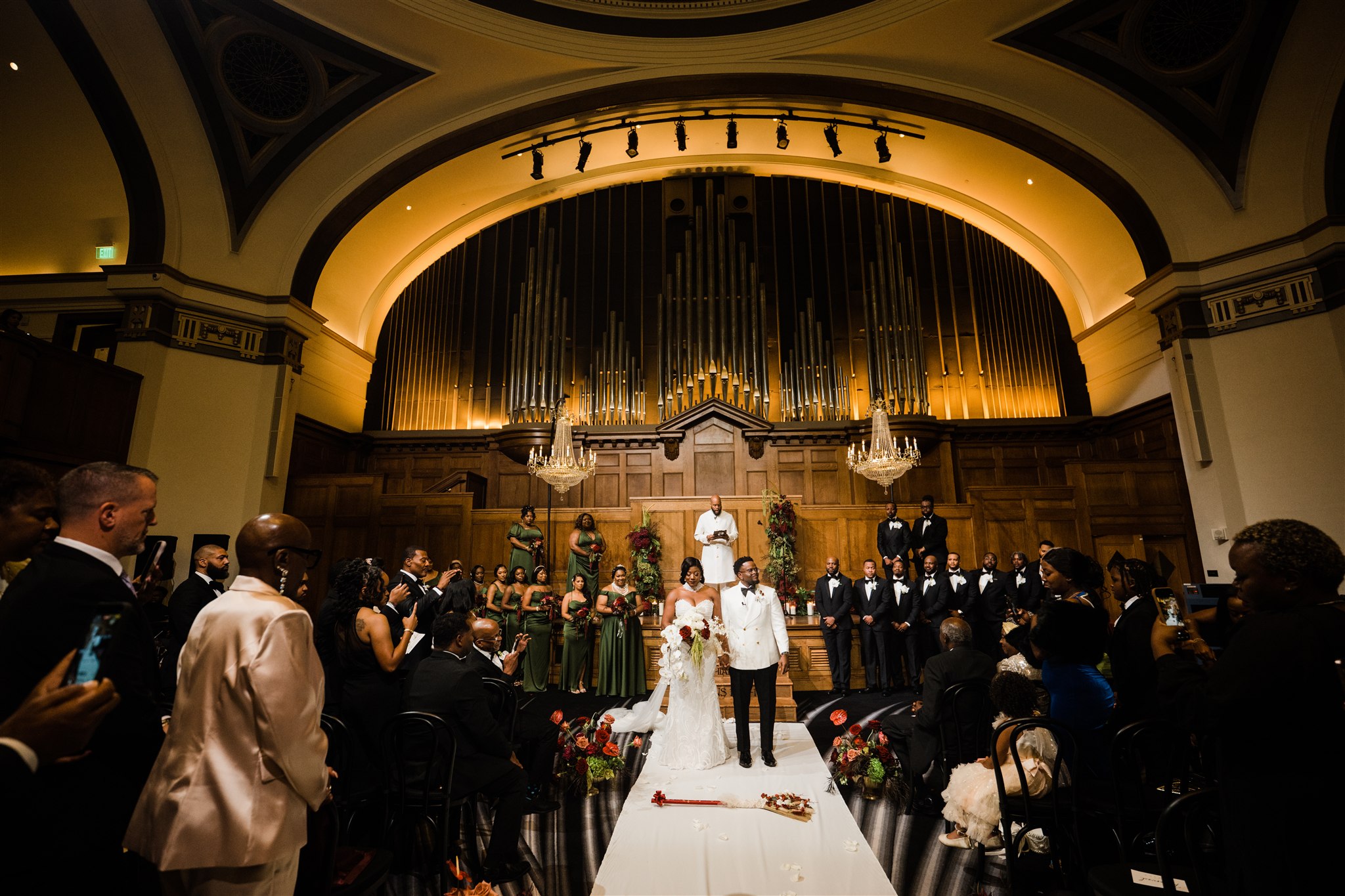 Lotte Hotel Seattle Wedding Couple Jumping the Broom